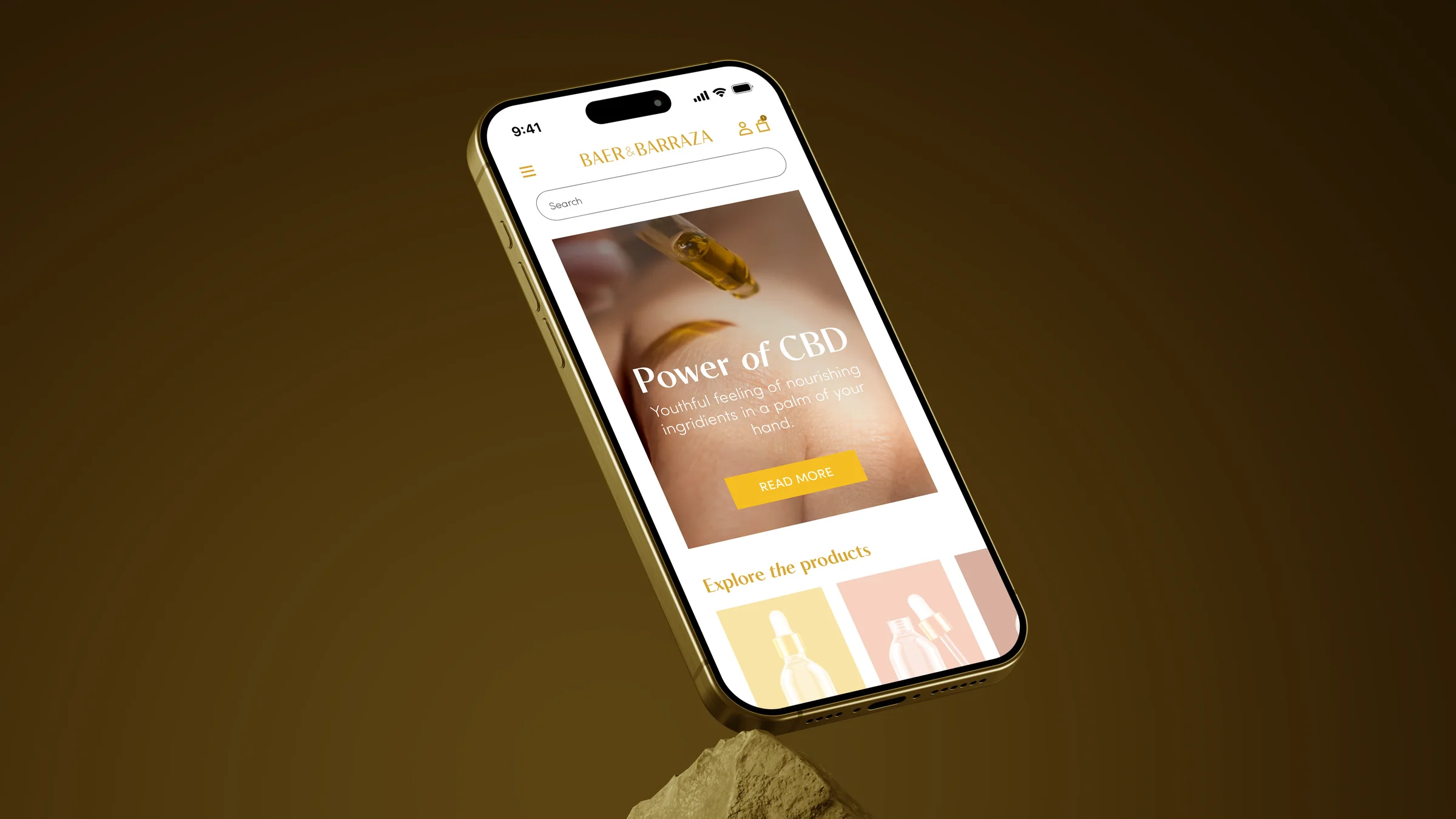 Mobile webshop design, Power of CBD, on a gold phone resting on a stone