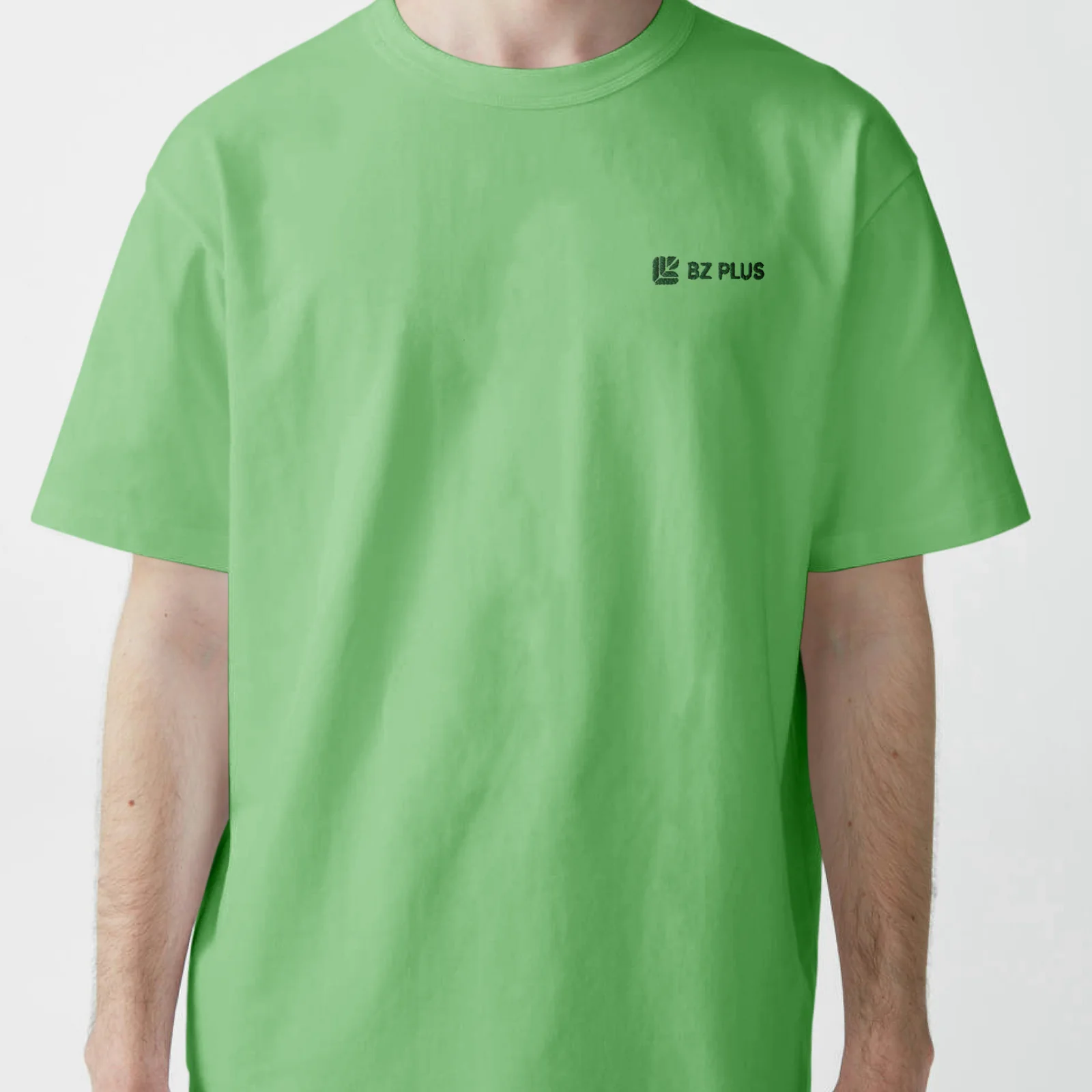 Leaf green work t-shirt with a small BZ PLUS logo on the chest