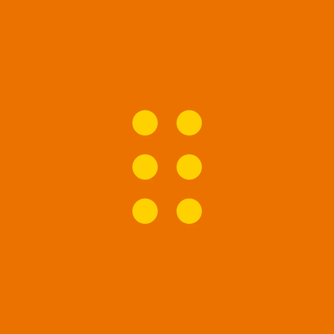 Six yellow studs on orange, the 2 x 3 brick from the logo